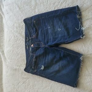Distressed denim shorts